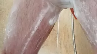 Playing in shower wearing tights