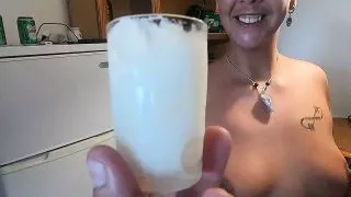 Girlfriend drinks a lots of saved cum from a shotglass