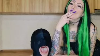 Human ashtray. Smoking fetish. Ash in the mouth and smoke in the slave's face