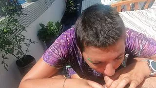 Blowjob on our terrace with some handfree sucking