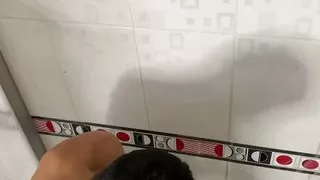 Attractive young man with a beautiful body takes a delicious bath