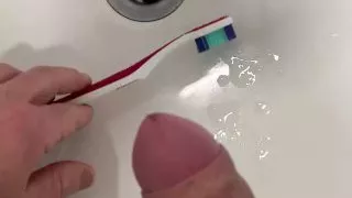 I cummed on my floor friend's toothbrush