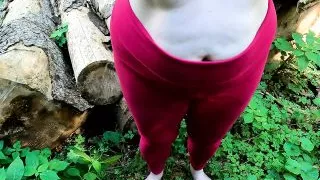 Barefoot and topless in the forest