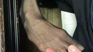 Sexy legs in nylon with tiny feet