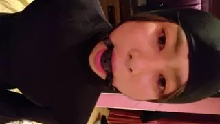 A cross-dressing boy masturbates with a ball gag and changes clothes.