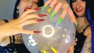 Fetish of inflatable balloons. Fetish of long sharp nails from two Dominatrixes.