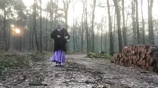 In bourgeois attire to go for a walk in the forest