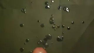 An explosive slow motion POV cumshot from a great reacharound handjob