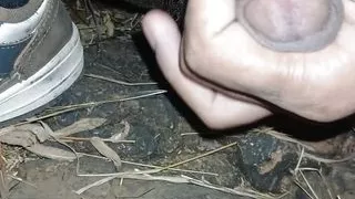 Boy masturbate in night time outdoor.