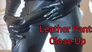 Leather pants and shiny gloves - Close-Up