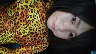 A cross-dressing boy masturbated in the car wearing full-body tights.