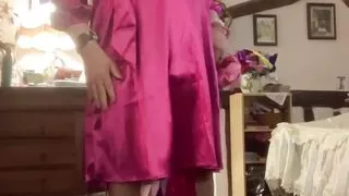 Dressed with a fuchsia dress for a night out