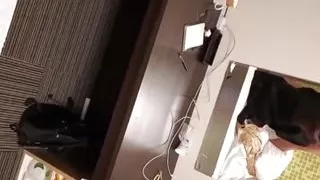 Shy Japanese babe gets horny in the hotel