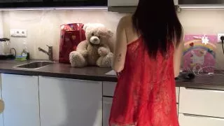 Hot sexy redhead college girl with her long legs and cotton panties in the kitchen gets bored and ignored