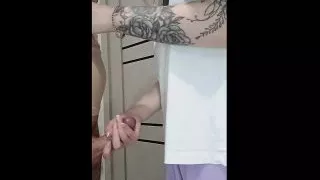 Stepmom's girlfriend jerks off young guy's dick at a family party