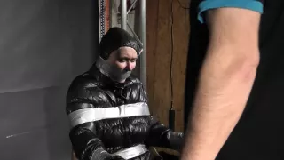 Alice Taped To A Chair And Tapegagged In Shiny Nylon Downjacket