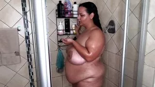 Big tits big ass BBW taking a hot teasing soapy shower