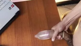 Fiddling with a condom filled with water Watch my milk get trapped inside! ????