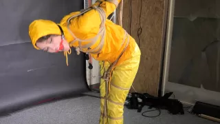 Marie Tied And Gagged In Shiny Nylon Rainwear