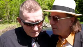 Scarlet Rose does sucks and fucks two huge cocks outdoors