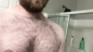 Hairy otter squirts on floor, shows off balls