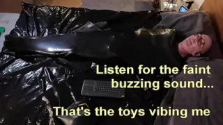 Cocooned in Latex and Teased with Buzzing Toys