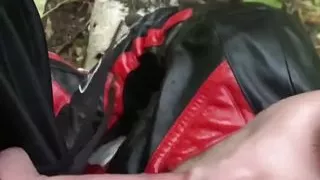 Leather Biker sucks in the forest by sport guy