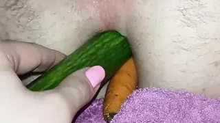Cucumber and carrot healthy diet from the ass side