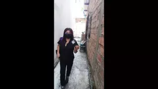 Nurse dancing very sensually at her patient's home