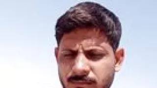 Handsome man rubbing his beutifull body in sunshine