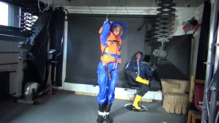 Ronja Being Tied, Gagged And Hooded Hanging With Ropes And A Ballgag From Stella Both Wearing Sexy Shiny Nylon Rainwear And Ronja A Lifevest (Video)