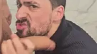 Hot daddy sucking twink big cock in a public bathroom