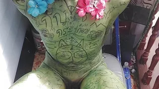 The clown undresses and writes himself.