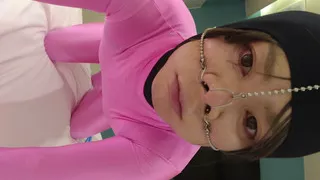 A cross-dressing boy has been transformed into a cute pink female pig with full-body tights and a nose hook.