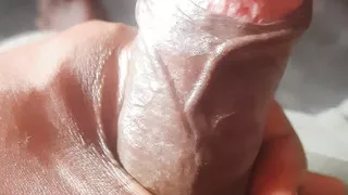 A south asian boy is engaging in self-exploration at home.