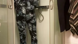 Wetsuit and gasmask in the shower