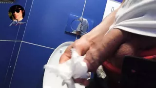 Gay twink pisses pee, masturbates his penis and ejaculates sperm in the toilet