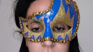 Girl in mask masturbating dances in front of camera
