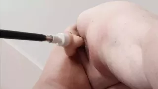 Depraved mother-in-law having fun with a sex machine