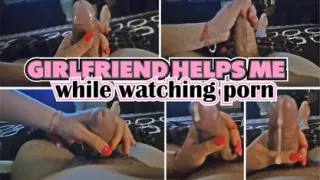 Girlfriend gives me a hand while watching porn.