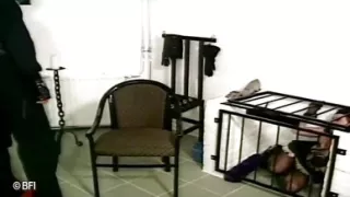 Pouring wax all over her bound body