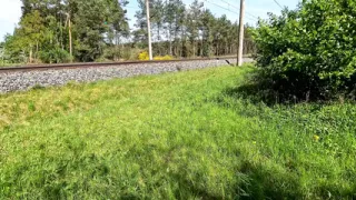 Whipping naked breasts at the train station