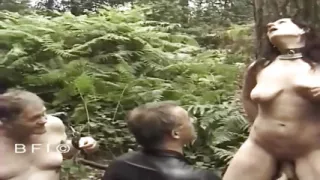 Tied up milf gets punished outdoors