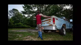 Jon Scarecrow Big Fake tits Crossdresser in Snug Plaid Dress and Cow Girl Boots Outside