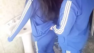 A student was caught in the bathroom. She couldn't stand the pressure on her pussy and came quickly.