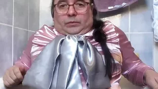 In bourgeois attire to take a piss shower