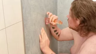 amateur sucks dildo in the shower