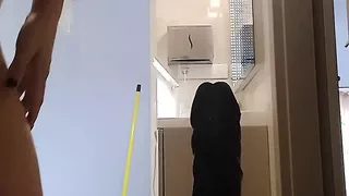 Riding a black dildo