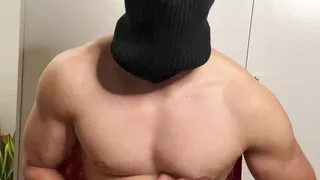 Young hunk strokes his cock in boxers and balaclava
