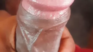 A South Asian young man is engaging in self-pleasure at home.